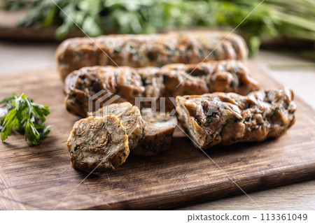Traditional Czech Karlovy Vary dumplings on a cutting board 113361049