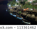 Night boats on the river. 113361462