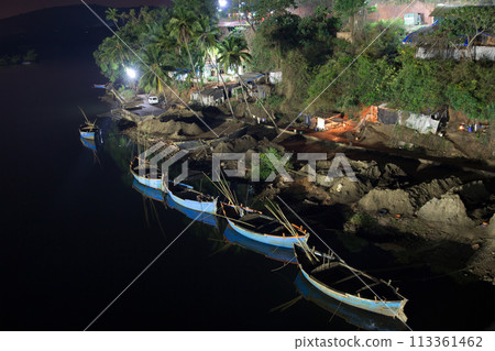 Night boats on the river. 113361462