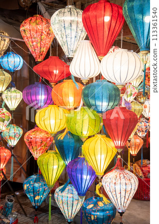 A beautiful night view of illuminated lanterns in the world heritage city of Hoi An A beautiful night view of illuminated lanterns in the world heritage city of Hoi An 113361540