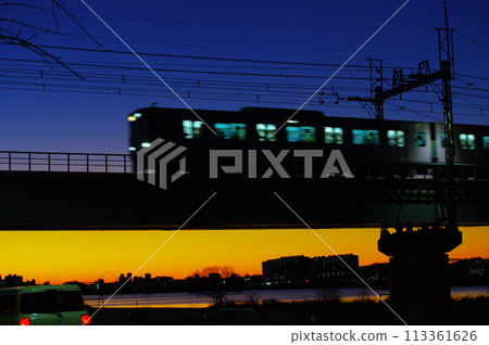 Keio Line passing over Tamagawa Bridge early in the morning Keio Line passing over Tamagawa Bridge early in the morning 113361626