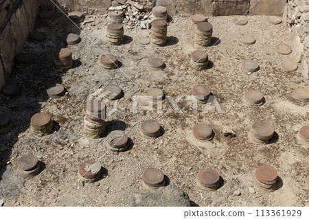 Remains of ancient stone artifacts, baths in the Archaeological Park of Paphos, Cyprus Remains of ancient stone artifacts, baths in the Archaeological Park of Paphos, Cyprus 113361929