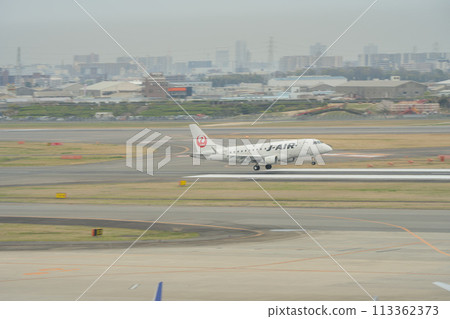 Landing at Itami Airport Landing at Itami Airport 113362373