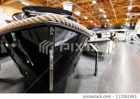 Many small big ship yachts at boat show exhibition indoors hall. Marine fishing yachting sailing vessel expo commercial trading business. Modern recreation sport water transport fair Many small big ship yachts at boat show exhibition indoors hall. Marine fishing yachting sailing vessel expo commercial trading business. Modern recreation sport water transport fair 113362483