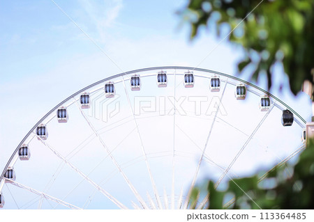 Ferris wheel against on blue sky. Ferris wheel against on blue sky. 113364485