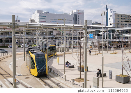 Utsunomiya Light Rail: A modern train heading to the Utsunomiya Station East Exit stop, Utsunomiya City, Tochigi Prefecture Utsunomiya Light Rail: A modern train heading to the Utsunomiya Station East Exit stop, Utsunomiya City, Tochigi Prefecture 113364933