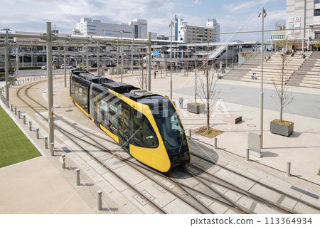 Utsunomiya Light Rail: A modern train heading to Haga from the east exit of Utsunomiya Station, Utsunomiya City, Tochigi Prefecture 113364934