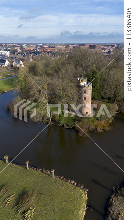 Schonauwen Castle, locally known as Kasteel Schonauwen in the province of Utrecht in the Netherlands. Beautiful view from above. Beautiful Dutch canals are filled with water. 113365405