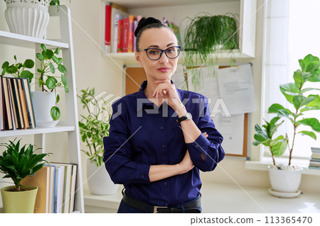 Portrait of beautiful confident woman 40 years old looking at camera 113365470