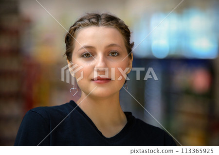 young woman portrait teenager girl happy university student close-up 113365925