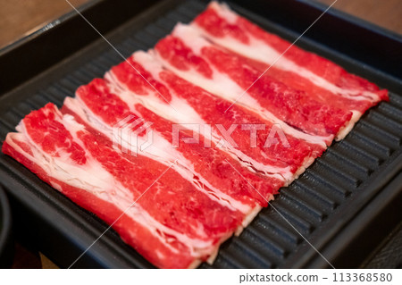 Close-up of sliced raw meat for hot pot 113368580