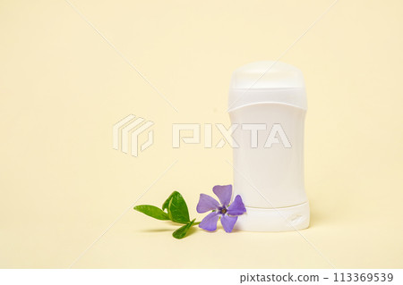 White deodorant and herbs purple flower on light background, copy space 113369539
