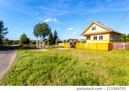 Rural wooden house in russian village in summer Rural wooden house in russian village in summer 113369705