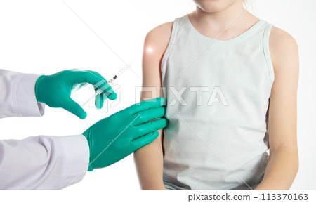 The hands of a doctor in green medical gloves vaccinate a little girl with a syringe into the shoulder against rubella and polymeolitis. Revaccination, copy space for text The hands of a doctor in green medical gloves vaccinate a little girl with a syringe into the shoulder against rubella and polymeolitis. Revaccination, copy space for text 113370163