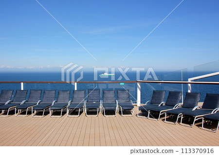 The upper deck of a large ocean-going tourist ship. The upper deck of a large ocean-going tourist ship. 113370916