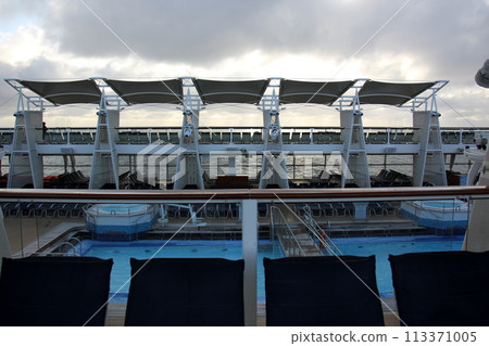 The upper deck of a large ocean-going tourist ship. The upper deck of a large ocean-going tourist ship. 113371005