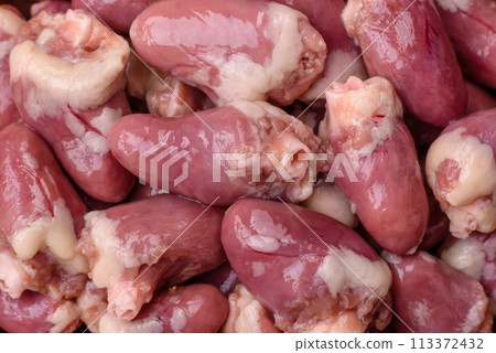 Raw chicken hearts with salt, spices and herbs Raw chicken hearts with salt, spices and herbs 113372432