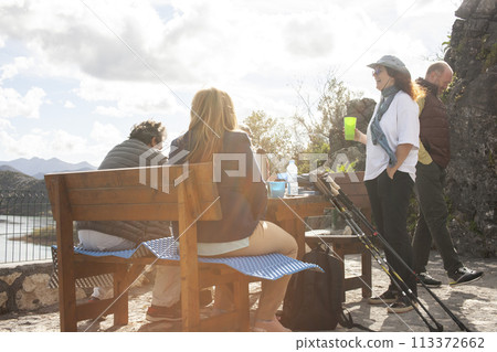 senior friends tourists outdoor adventure together on mediterranian sea close up 113372662