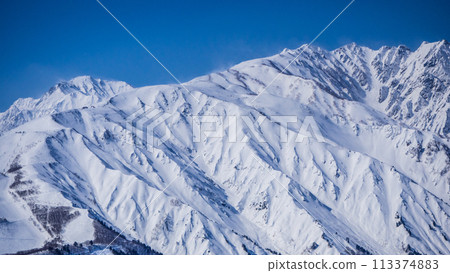 Hakuba Village in winter, distant view of the snow-capped Northern Alps 113374883