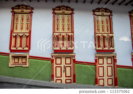 Beautiful facade of the houses at the historical downtown of the heritage town of Salamina located at the Caldas department in Colombia. 113375062