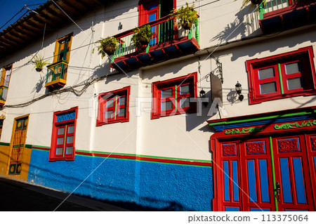 Beautiful facade of the houses at the historical downtown of the heritage town of Salamina located at the Caldas department in Colombia. 113375064