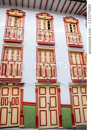 Beautiful facade of the houses at the historical downtown of the heritage town of Salamina located at the Caldas department in Colombia. 113375084