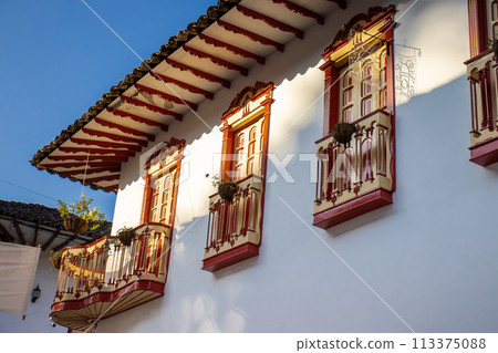 Beautiful facade of the houses at the historical downtown of the heritage town of Salamina located at the Caldas department in Colombia. 113375088