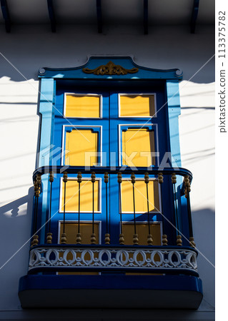 Beautiful facade of the houses at the historical downtown of the heritage town of Salamina located at the Caldas department in Colombia. 113375782