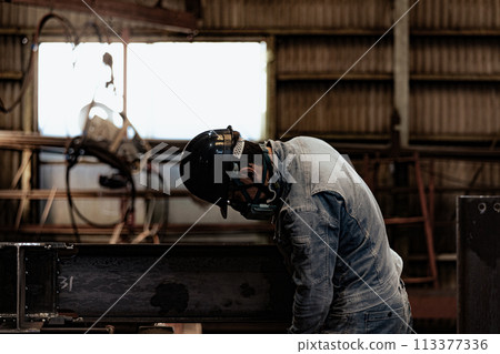 Steel factory worker 113377336
