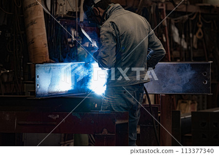 Steel factory worker 113377340