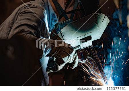 Steel factory worker 113377361