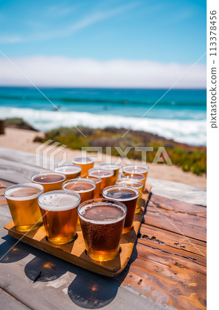 A wooden tray with a variety of beer glasses on it 113378456
