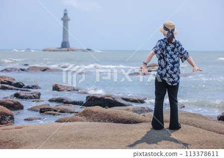 Woman on vacation Woman on vacation 113378611