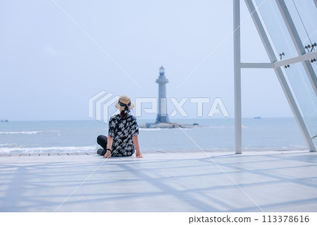 Woman on vacation 113378616