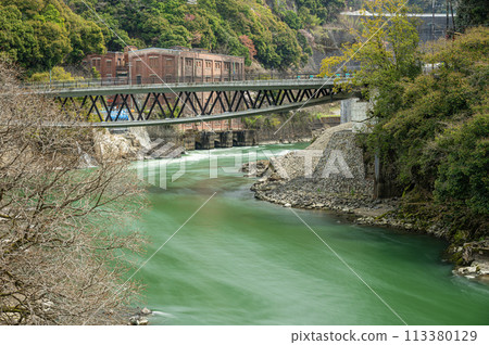 Uji River scenery: Hakuko Bridge and the former Shizugawa Power Plant, Uji City, Kyoto Prefecture 113380129