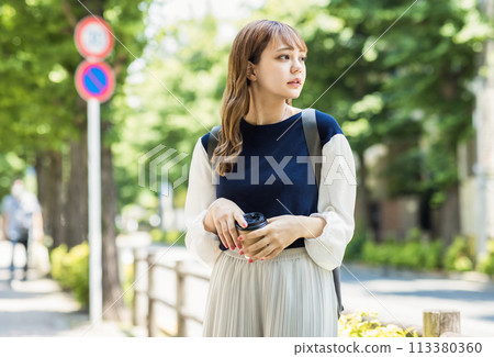 A young woman with a smile 113380360