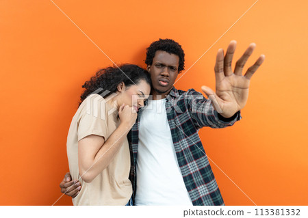 Young Couple Emotionally Distressed Seeking Comfort Orange Background 113381332