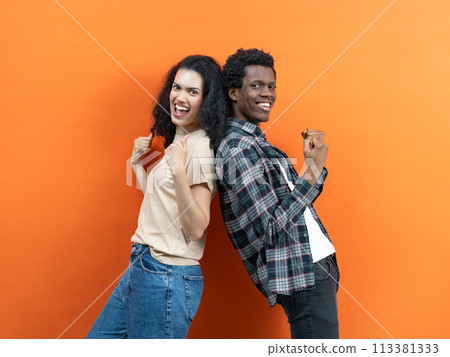 Happy Young Couple Celebrating Success Together Happy Young Couple Celebrating Success Together 113381333
