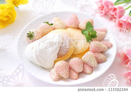Pancakes with white strawberry milky berries and fresh cream White strawberry pancakes 113382284