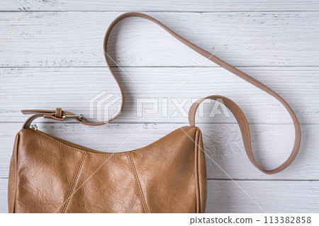 Brown colour leather woman handbag. 113382858