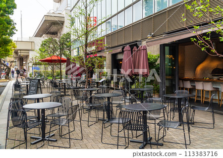 A stylish open terrace in front of Chofu Station, Tokyo 113383716
