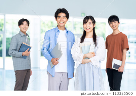 Male college student enjoying campus life 113385500
