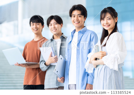 Male college student enjoying campus life 113385524