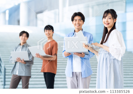 Male college student enjoying campus life 113385526