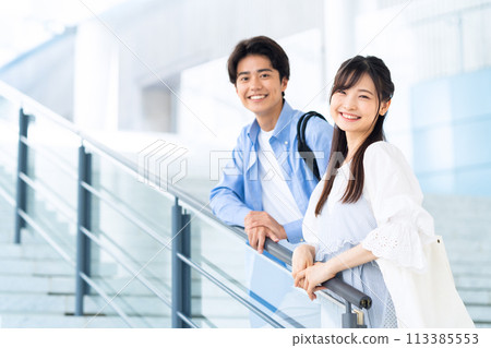 A college student couple enjoying campus life 113385553