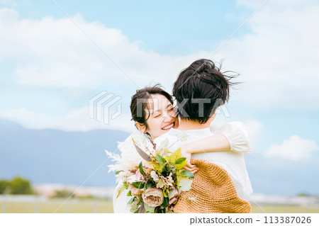 Couples and married couples having resort weddings and garden weddings 113387026