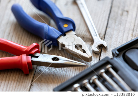 Screwdrivers set, pliers, instruments 113388810