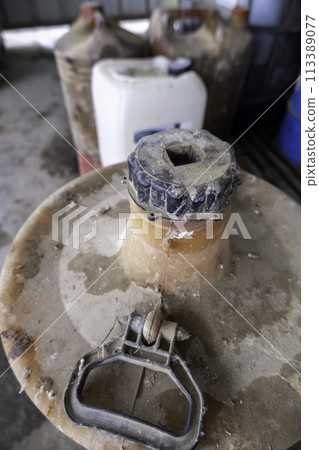 Detail of dirty and used oil, pollution and destruction of the environment 113389077