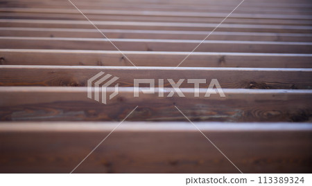 Wooden boards plank wall floor background texture closeup 113389324