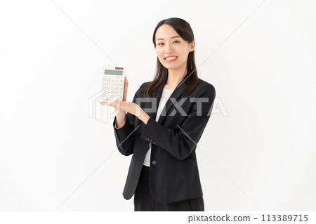 Young woman business with a calculator 113389715